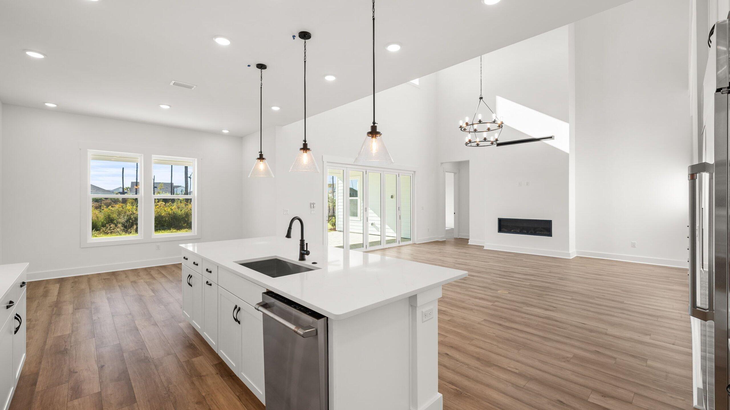 33 Dunns Cir Inlet Beach Inlet Beach, FL 32461 - Photo 6 of 82 a kitchen with stainless steel appliances granite countertop a sink a oven a refrigerator and a wooden floors