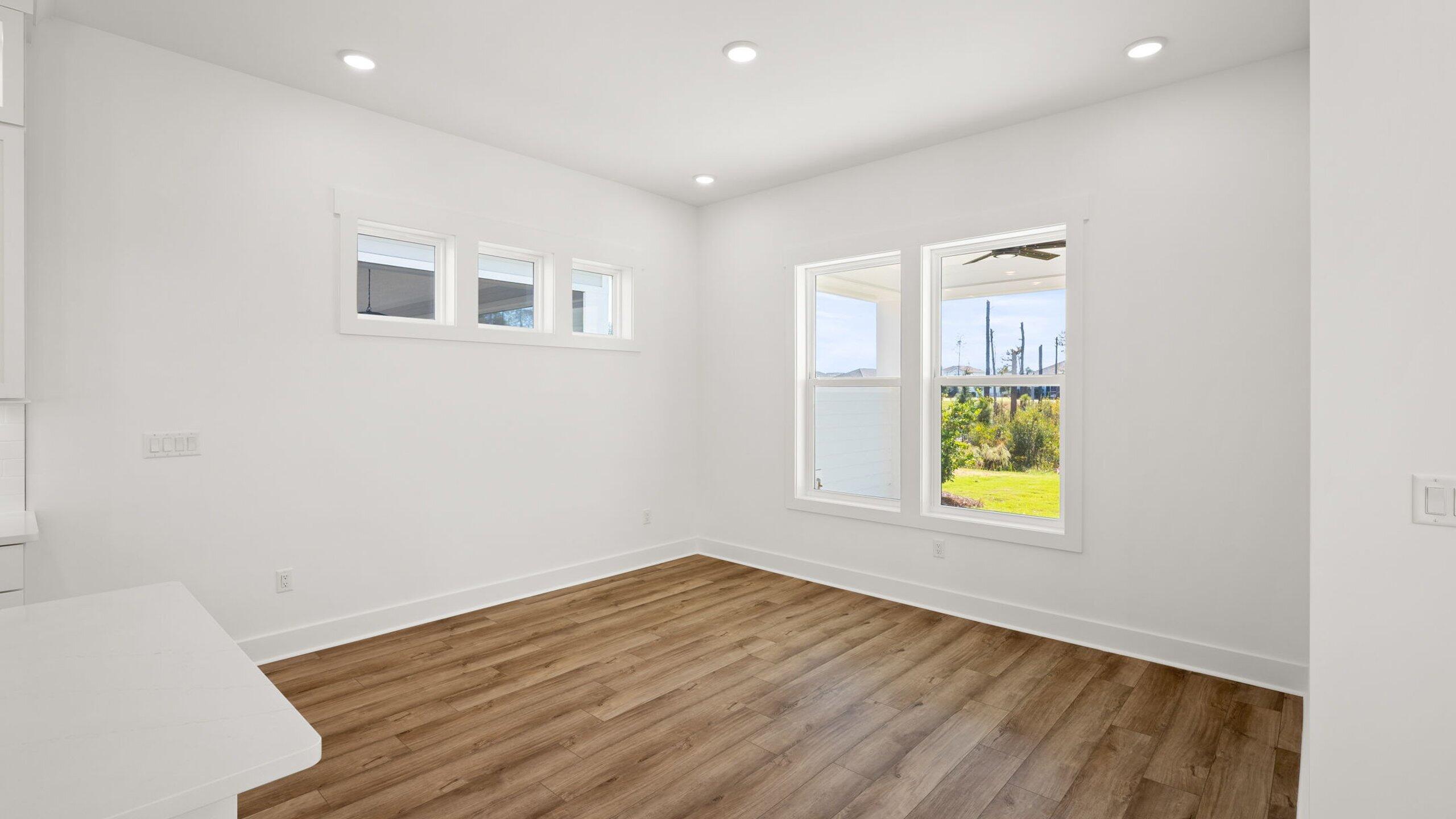 33 Dunns Cir Inlet Beach Inlet Beach, FL 32461 - Photo 9 of 82 a view of room with wooden floor and glass door