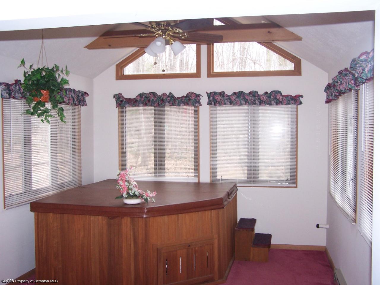 3284 Northgate Road Lake Ariel, PA 18436 - Photo 4 of 14 a bedroom with a bed and a window