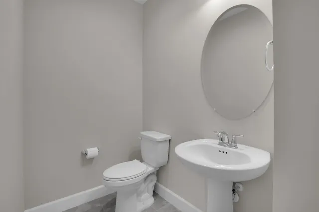 a bedroom with a bed and a cabinets