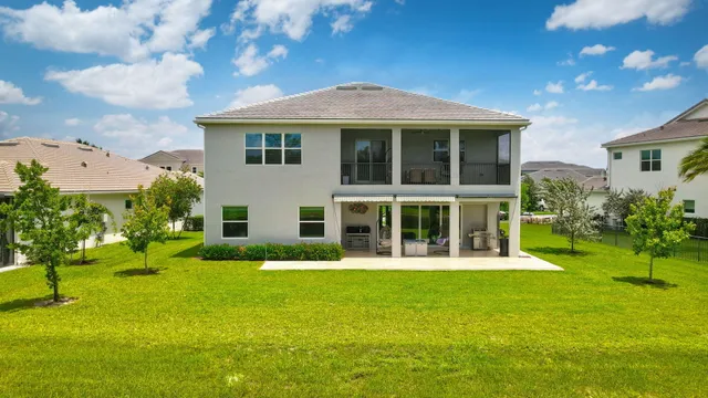an aerial view of residential building with lake view