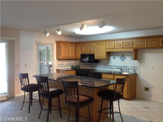 930 Mainsail Road Salisbury, NC 28146 - Photo 5 of 14 Kitchen. Freshly painted kitchen with stunning granite.