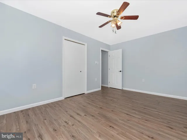 a bathroom with a sink a toilet and bathtub