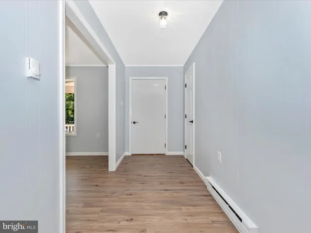 a view of livingroom with hardwood floor and window