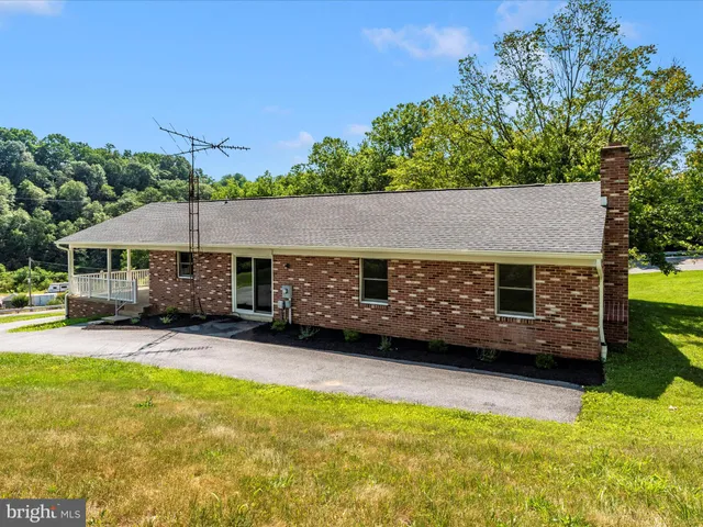 a view of a yard with an outdoor space