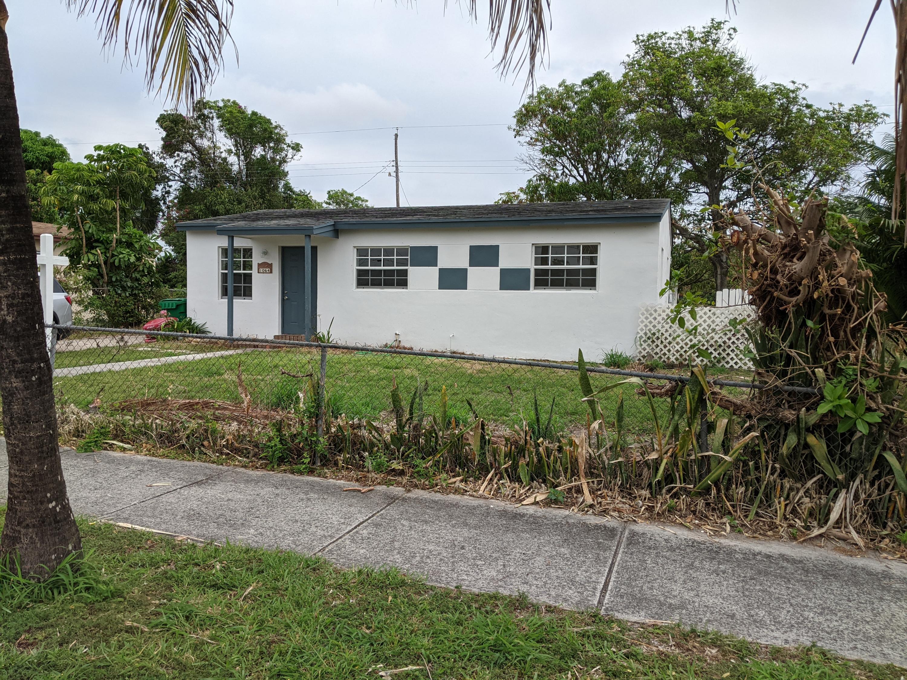 1064 West 27th Street Riviera Beach, FL 33404 - Photo 1 of 14 PXL_20210514_142826794