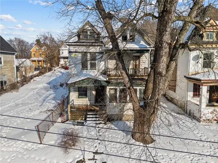 a view of a chairs and table in the patio