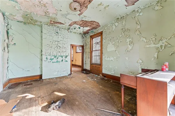 a view of a livingroom with bathroom