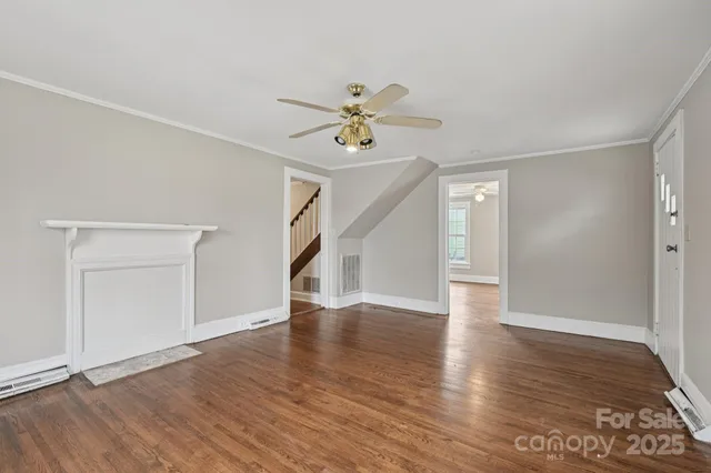 a kitchen that has a sink cabinets counter space and appliances