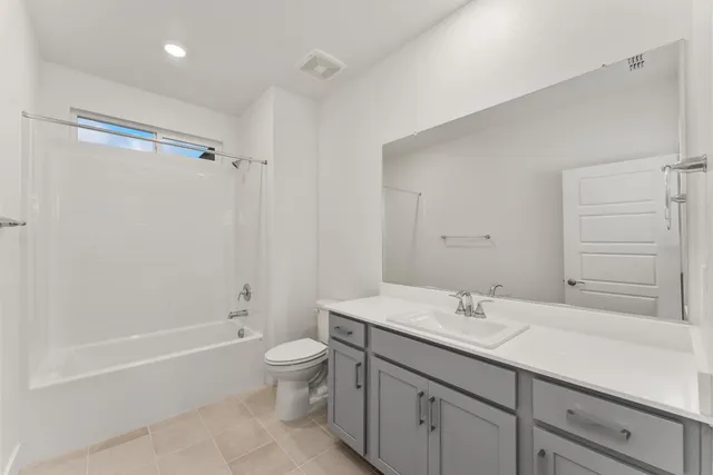 an empty room with closet area