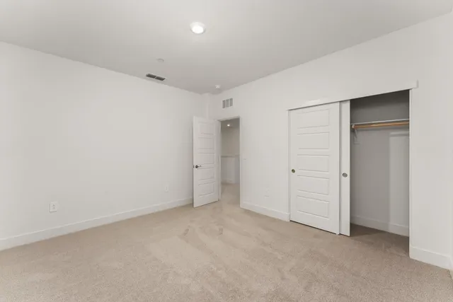a view of a house with backyard and a window