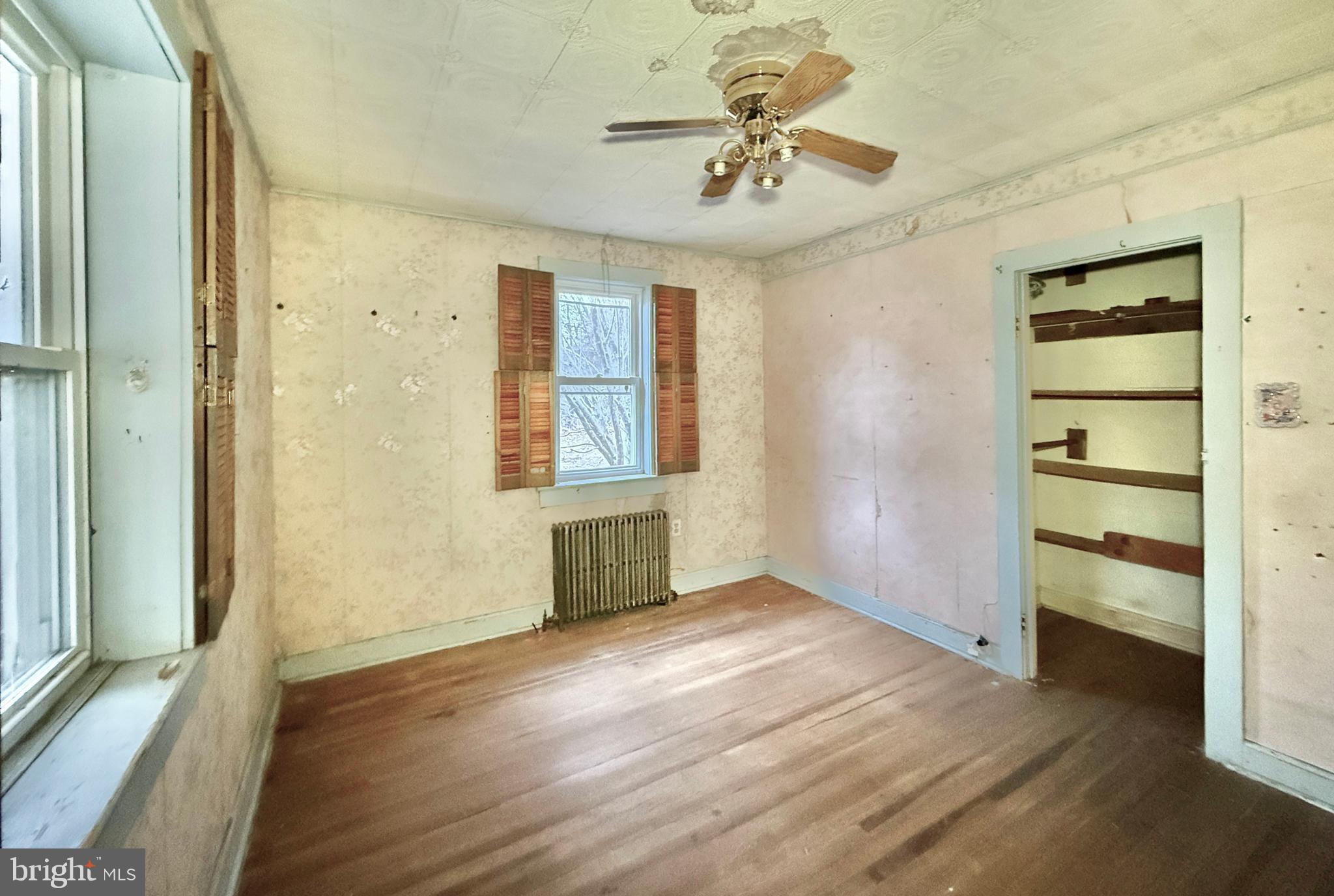 830 North Tuckahoe Road Williamstown, NJ 08094 - Photo 19 of 28 wooden floor in an empty room with a window