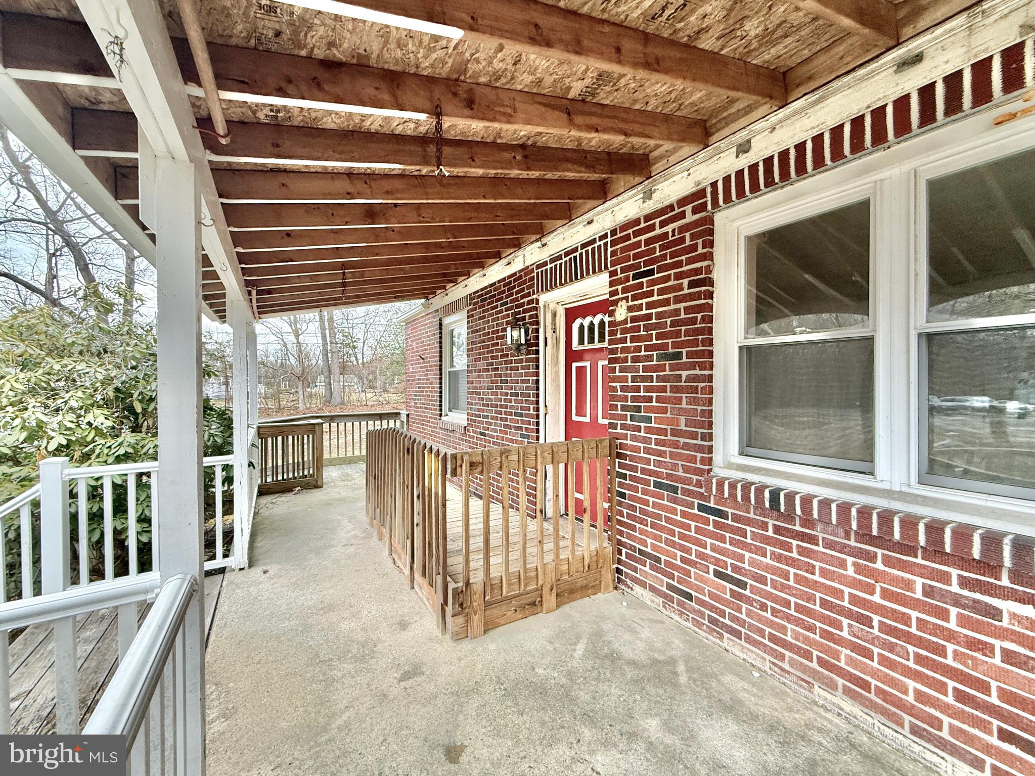 830 North Tuckahoe Road Williamstown, NJ 08094 - Photo 9 of 28 a view of a porch with a backyard