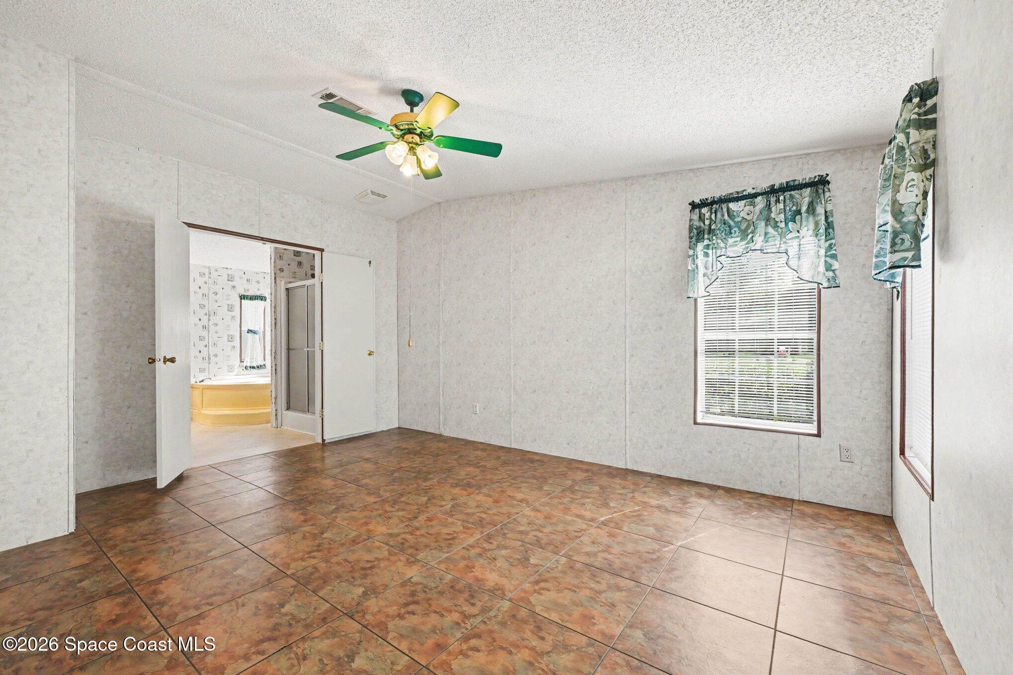 4785 Harrison Road Mims, FL 32754 - Photo 12 of 34 primary bedroom