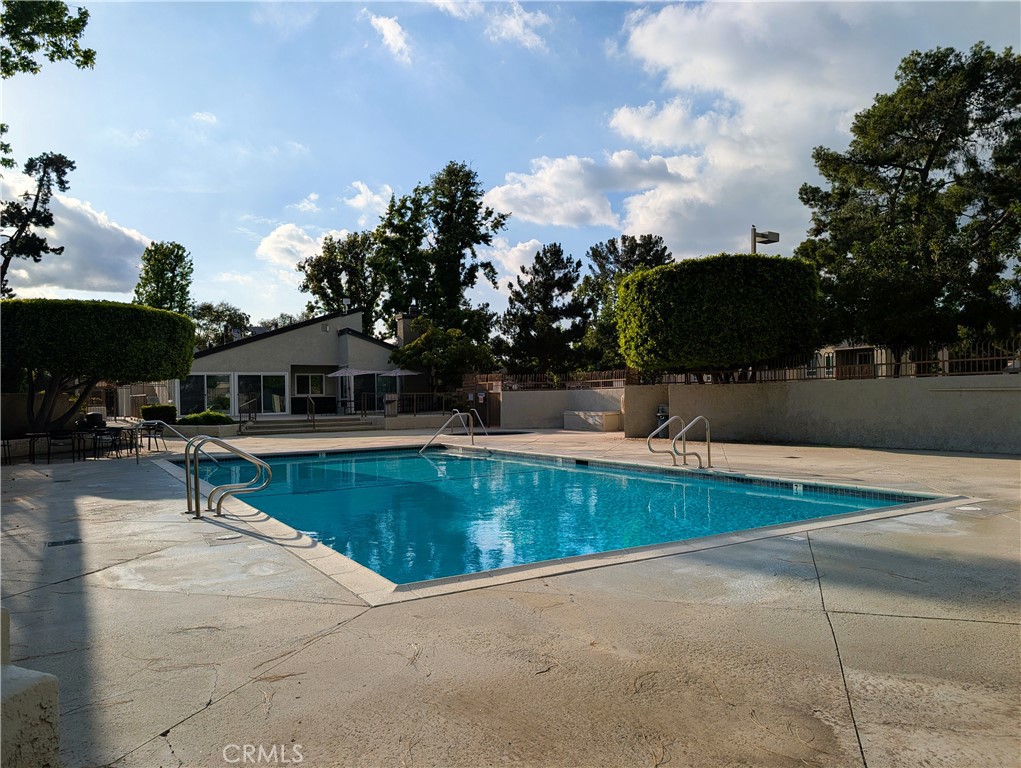 17052 Colima Road, Unit 206 Hacienda Heights, CA 91745 - Photo 12 of 15 a view of a house with swimming pool