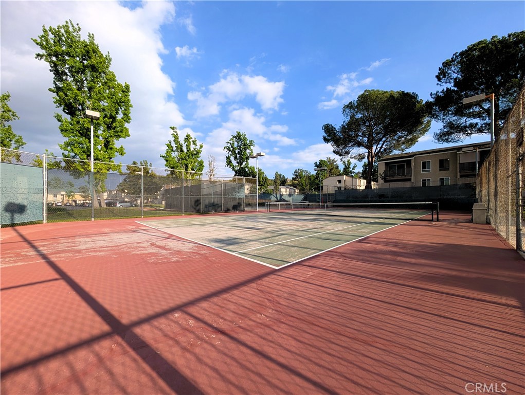 17052 Colima Road, Unit 206 Hacienda Heights, CA 91745 - Photo 13 of 15 a swimming pool with yard in front of it