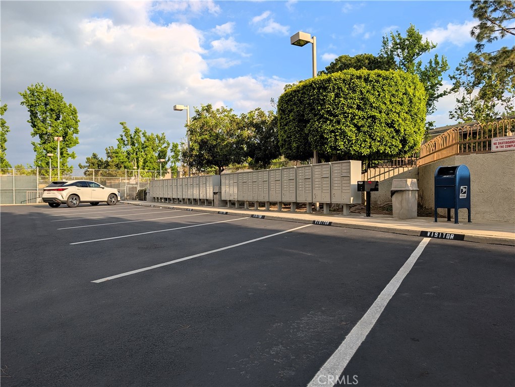 17052 Colima Road, Unit 206 Hacienda Heights, CA 91745 - Photo 14 of 15 a view of a street with cars on road