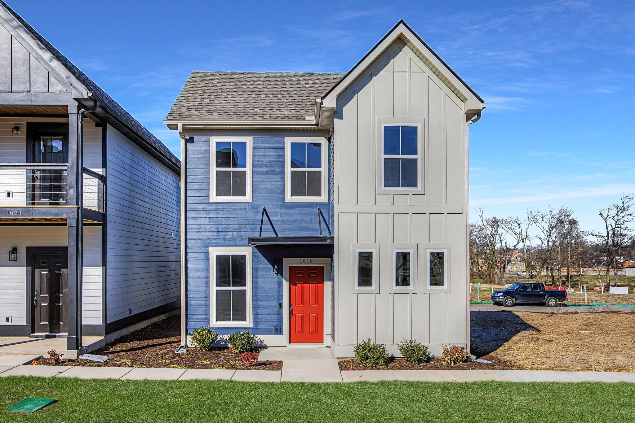 a view of house with yard