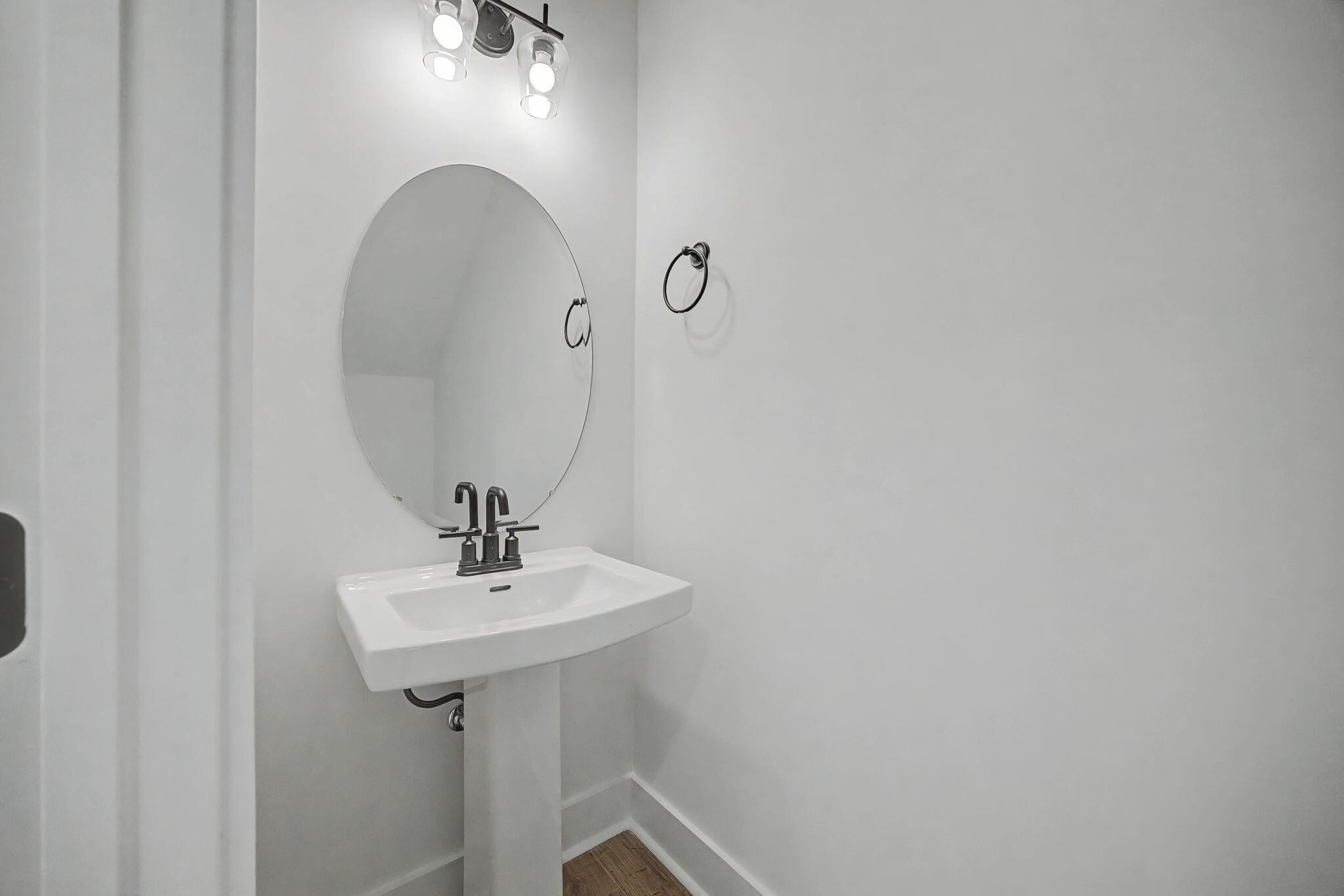 1616 Cotton Way Chattanooga, TN 37404 - Photo 12 of 38 a bathroom with a sink and a mirror