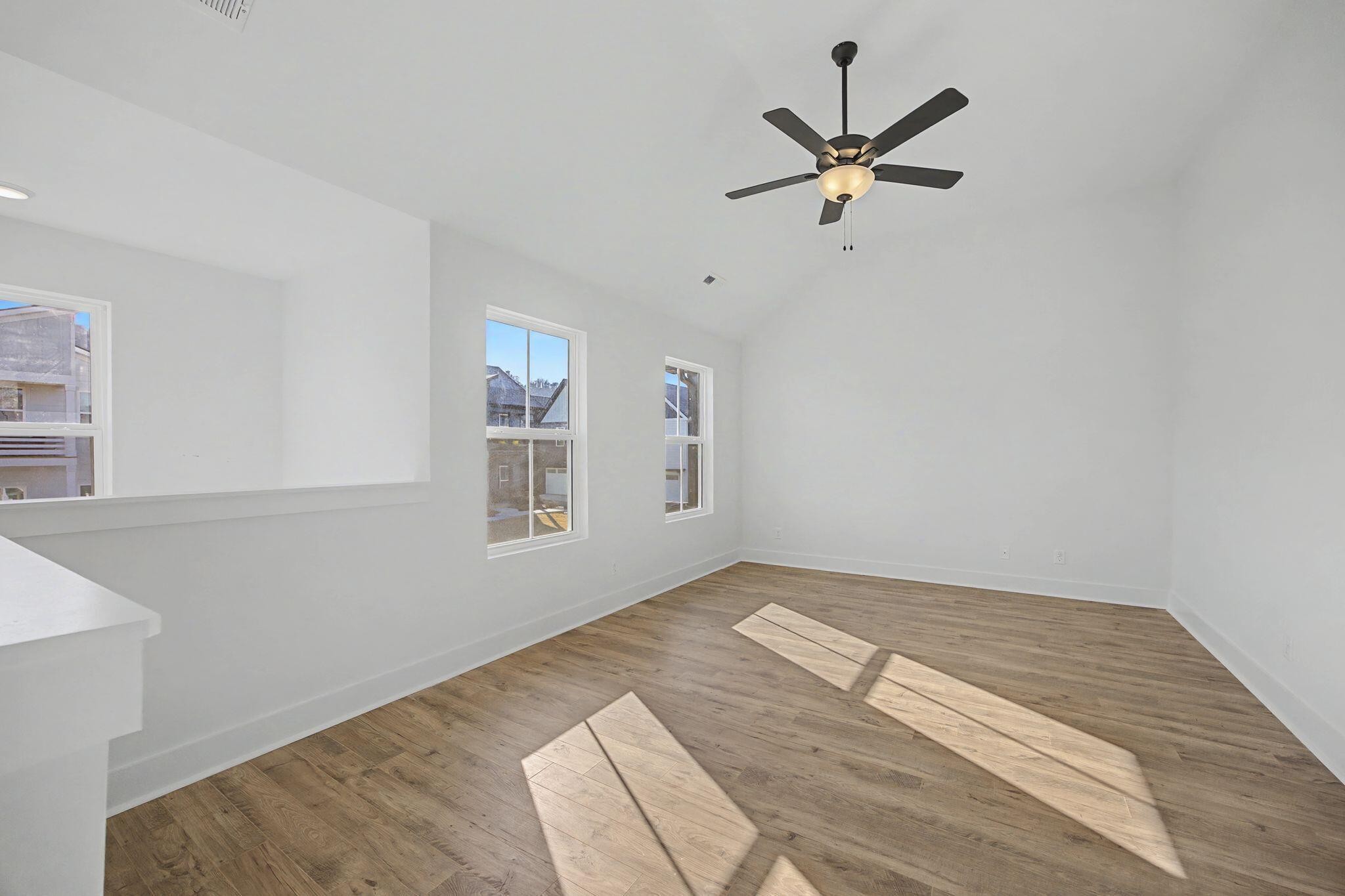 1616 Cotton Way Chattanooga, TN 37404 - Photo 14 of 38 a view of empty room with wooden floor and ceiling fan