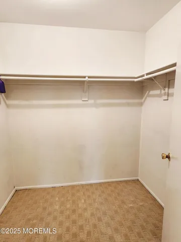 a view of small space with racks on the wall