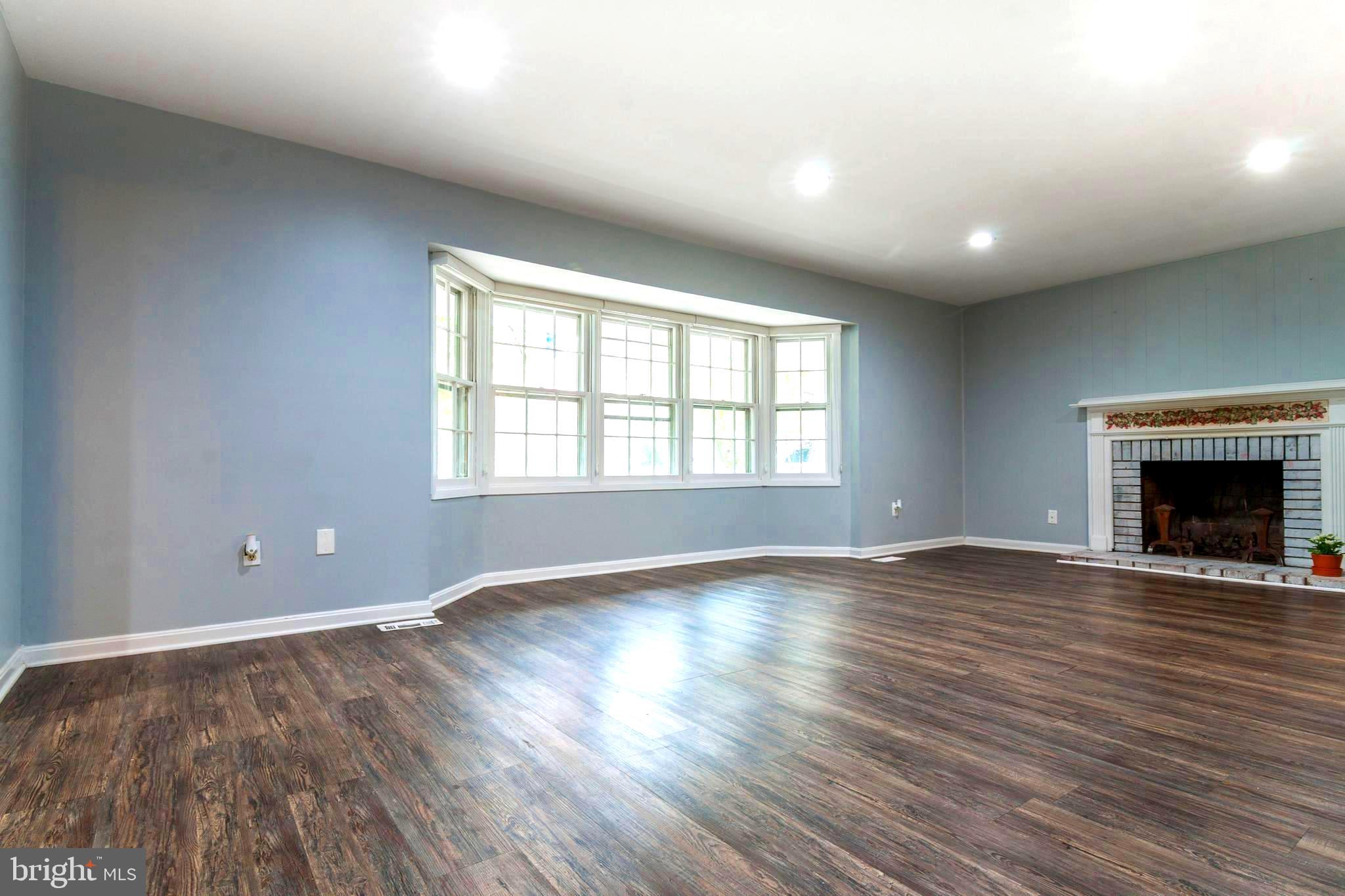 Living Room w/woodburning fireplace
