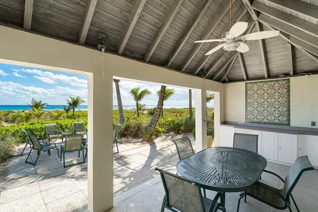 a view of an chairs and table in patio