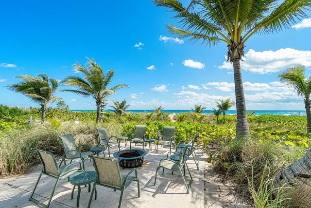 a view of yard with patio