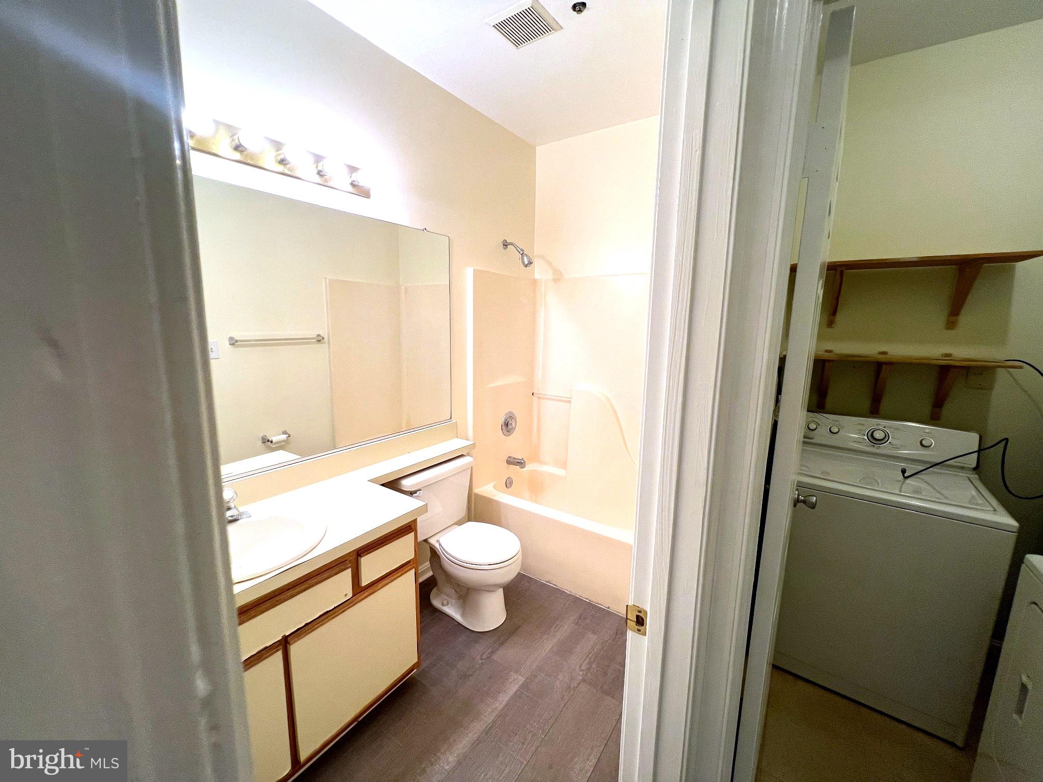604 Moonglow Road, Unit 102 Odenton, MD 21113 - Photo 15 of 27 Bright and functional bathroom space.