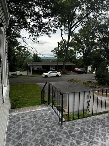 a view of a backyard with a garden