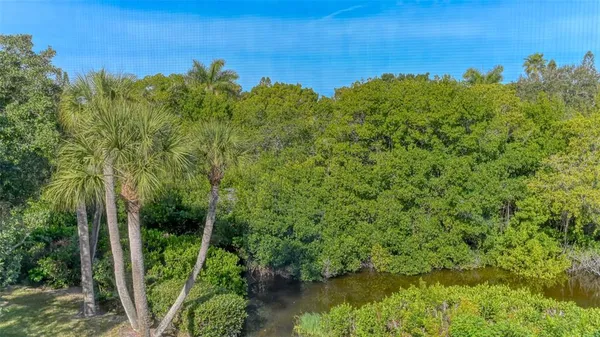 a view of a porch and garden