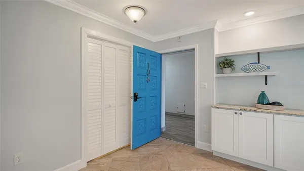 a view of an empty room with a window