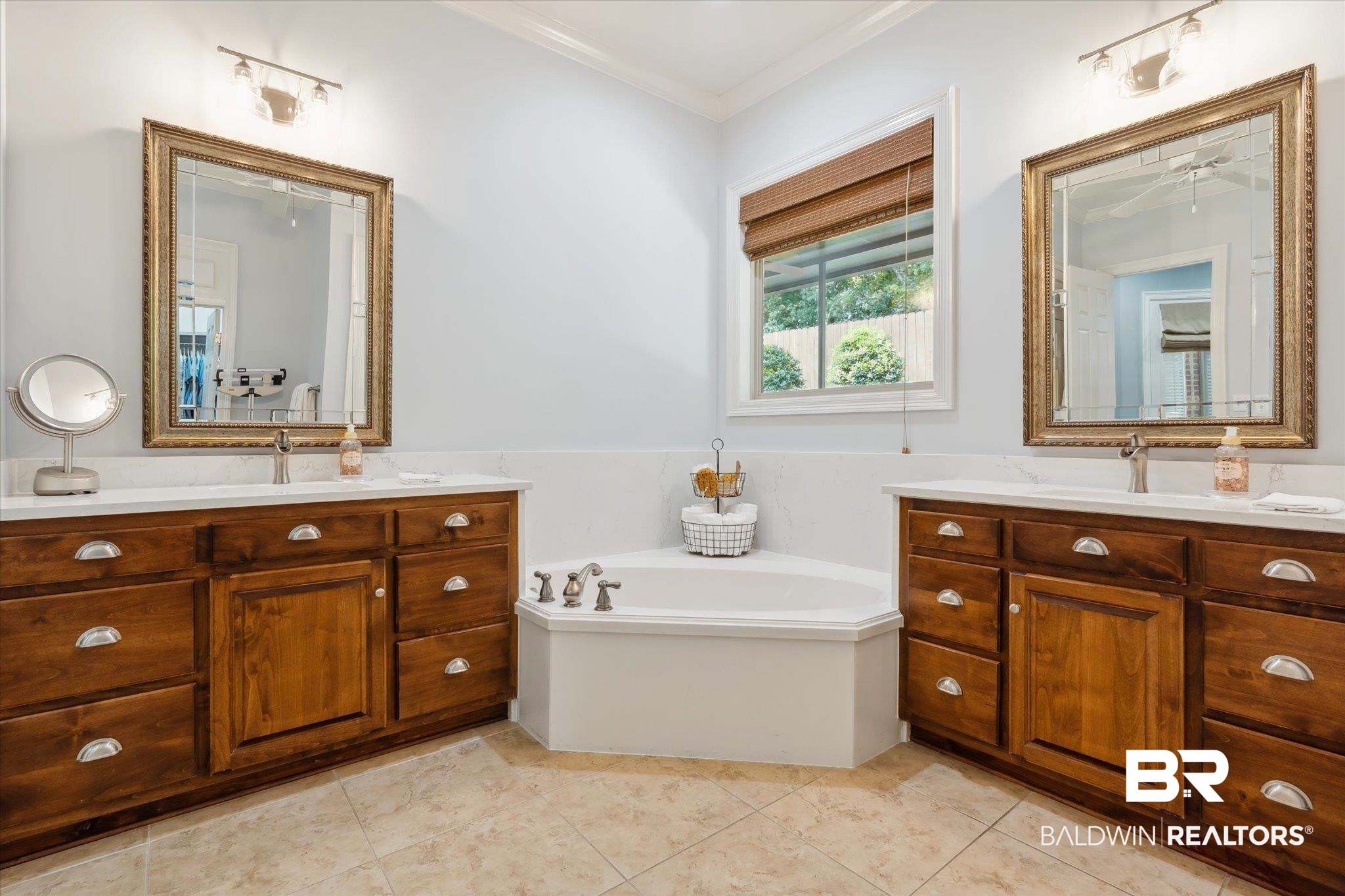 804 Country Club Road Mobile, AL 36609 - Photo 19 of 63 Bathroom with double sink vanity, tile patterned flooring, and a tub