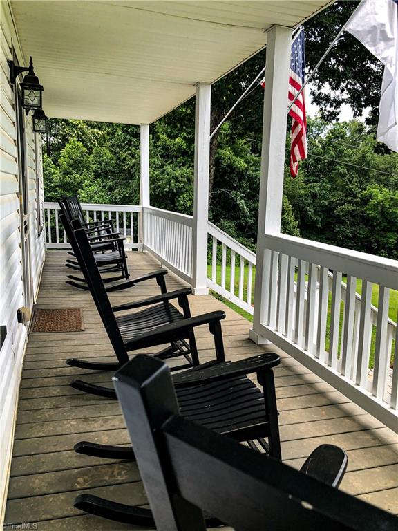 1127 Wood Stack Trail Road Westfield, NC 27053 - Photo 22 of 30 Rocking chair front porch. There is also a second level rocking chair porch/balcony with entrances from Master bedroom and one of the other bedrooms.