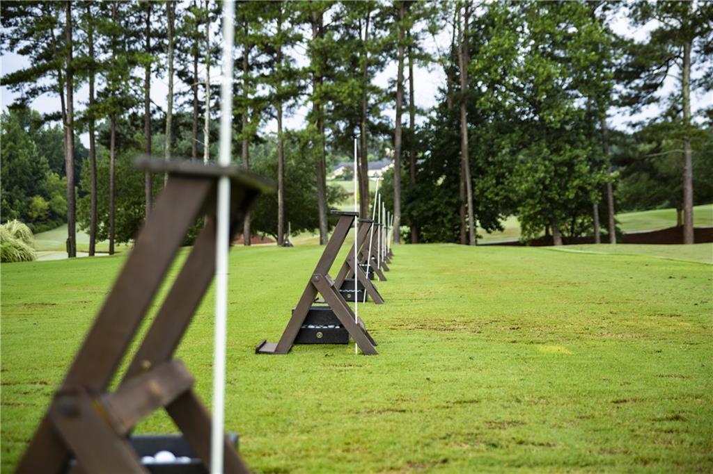 130 Talon Way Canton, GA 30115 - Photo 5 of 7 a view of a garden with a slide