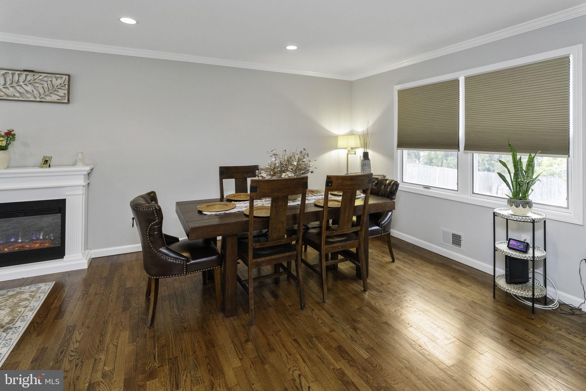 31 Wolfpack Road Hamilton, NJ 08619 - Photo 11 of 36 a view of a dining room with furniture window and wooden floor