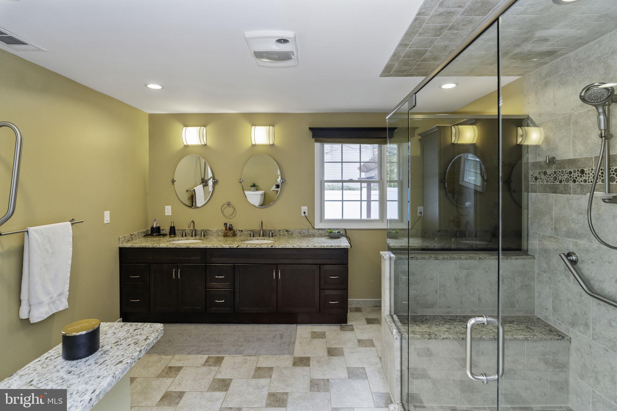 31 Wolfpack Road Hamilton, NJ 08619 - Photo 15 of 36 a bathroom with a sink and a mirror