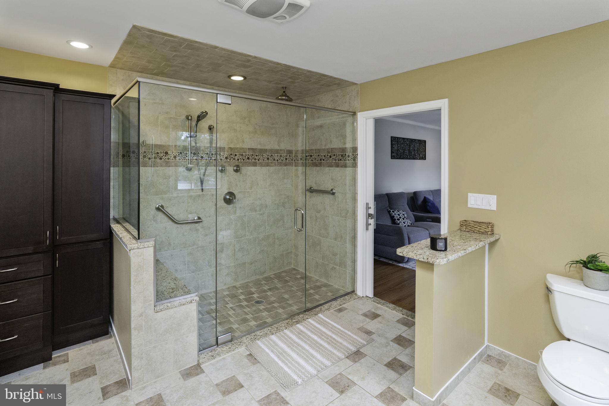 31 Wolfpack Road Hamilton, NJ 08619 - Photo 16 of 36 a bathroom with a shower a toilet and sink