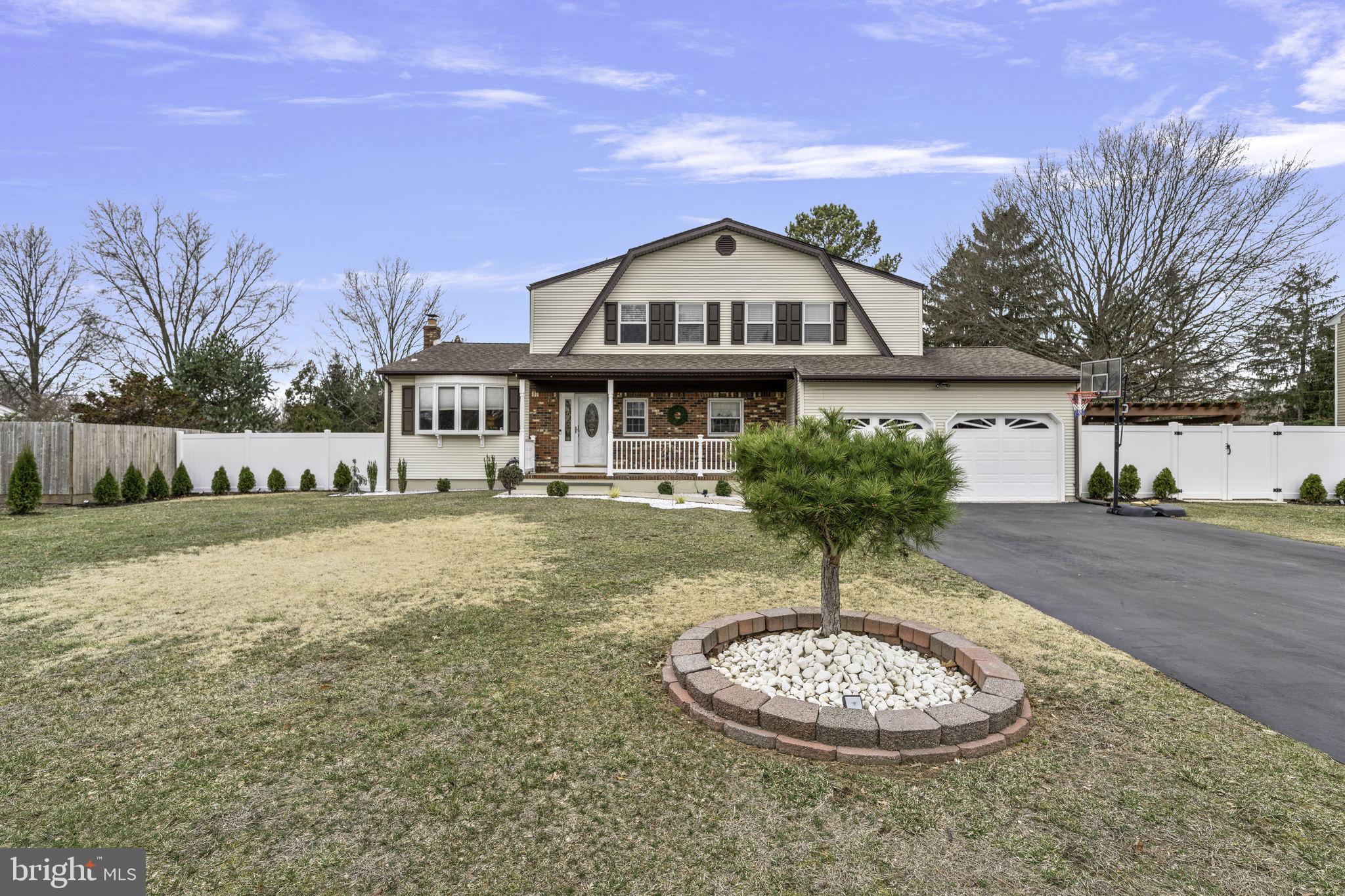 31 Wolfpack Road Hamilton, NJ 08619 - Photo 3 of 36 a view of a house with backyard and a garden