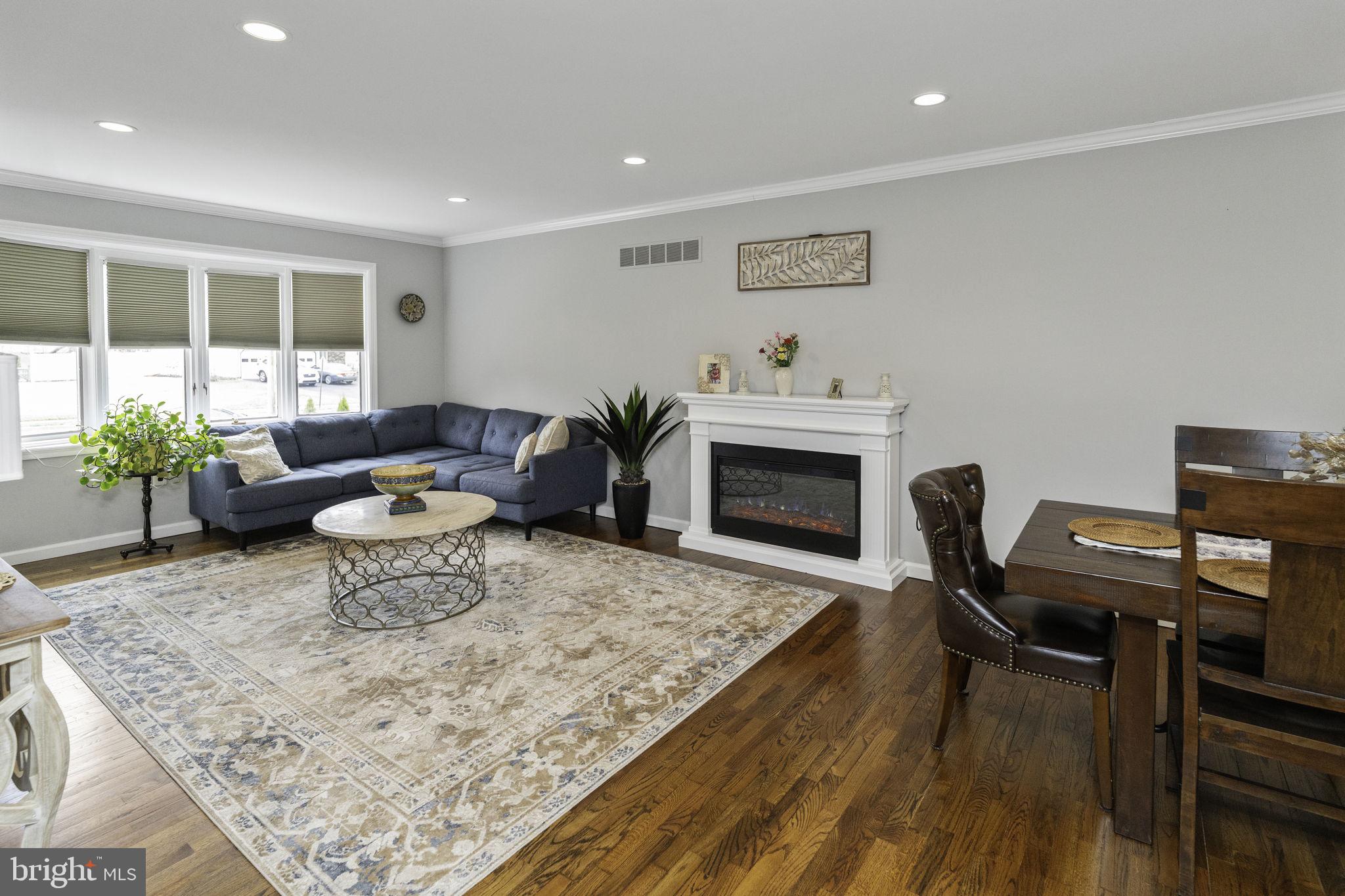 31 Wolfpack Road Hamilton, NJ 08619 - Photo 8 of 36 a living room with furniture and a fireplace