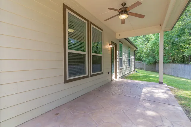 a view of empty room with windows