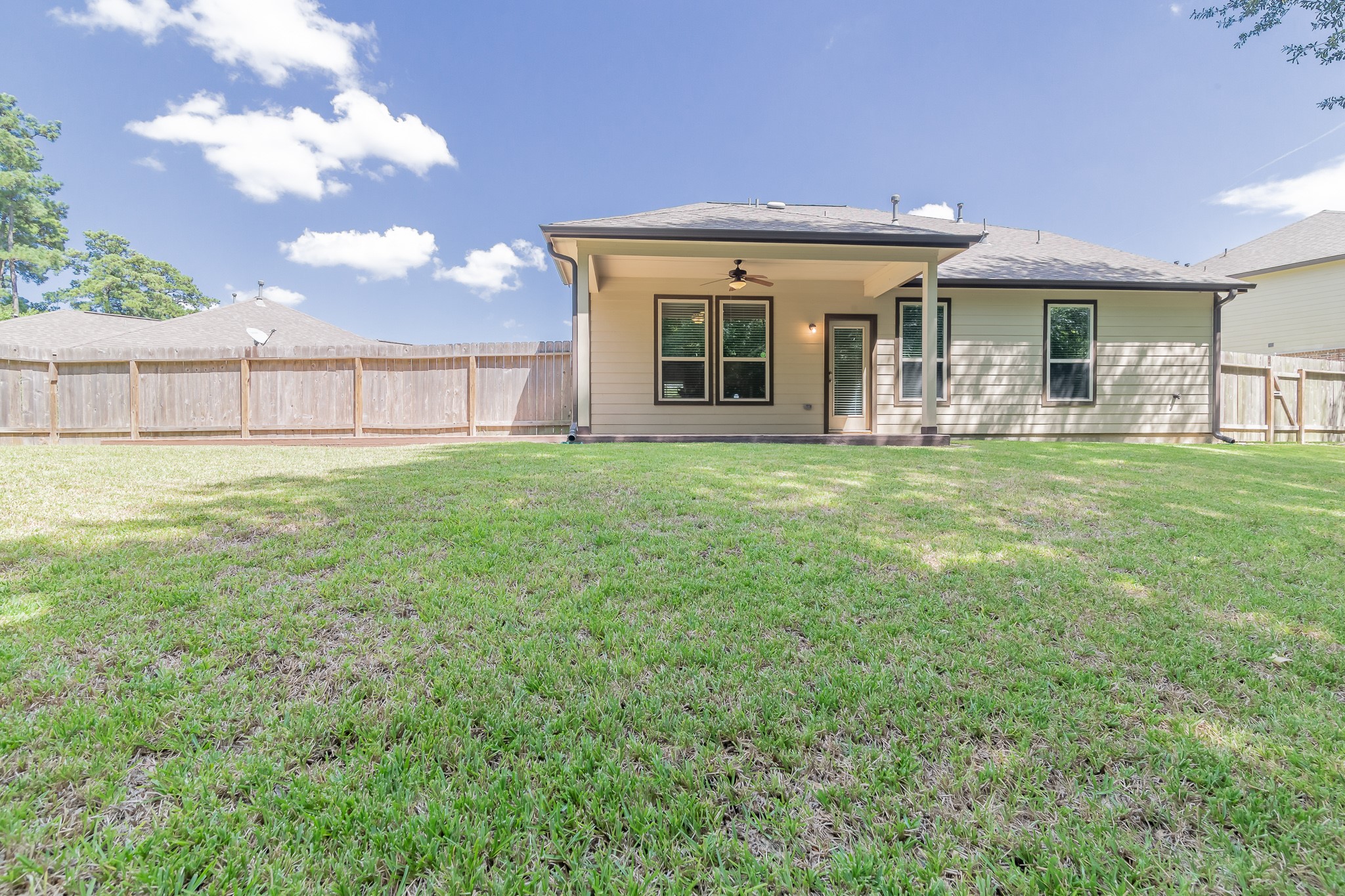 5 Iris Arbor Court Conroe, TX 77301 - Photo 21 of 35 a view of a house with a yard and porch