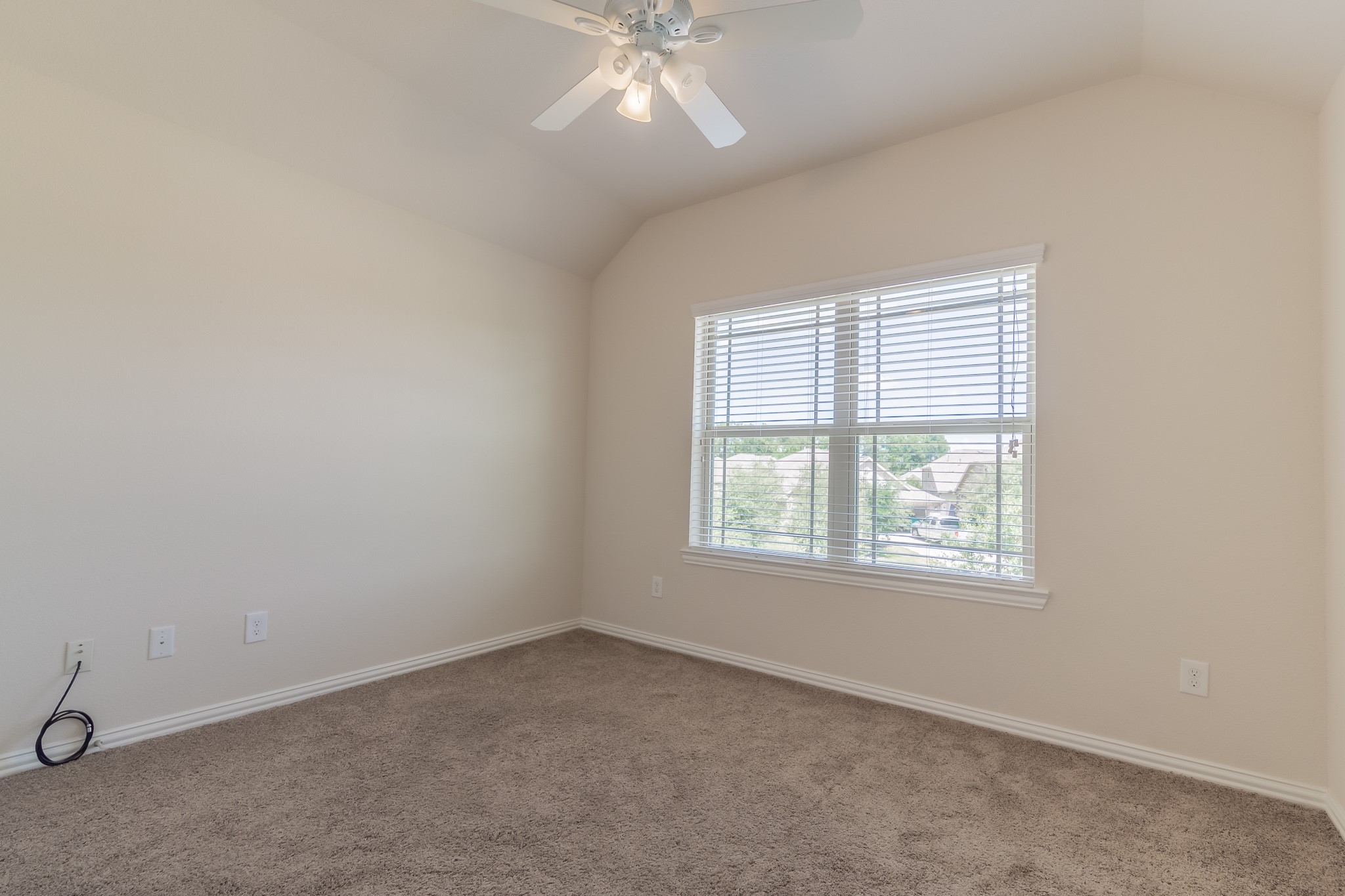 5 Iris Arbor Court Conroe, TX 77301 - Photo 31 of 35 an empty room with a window