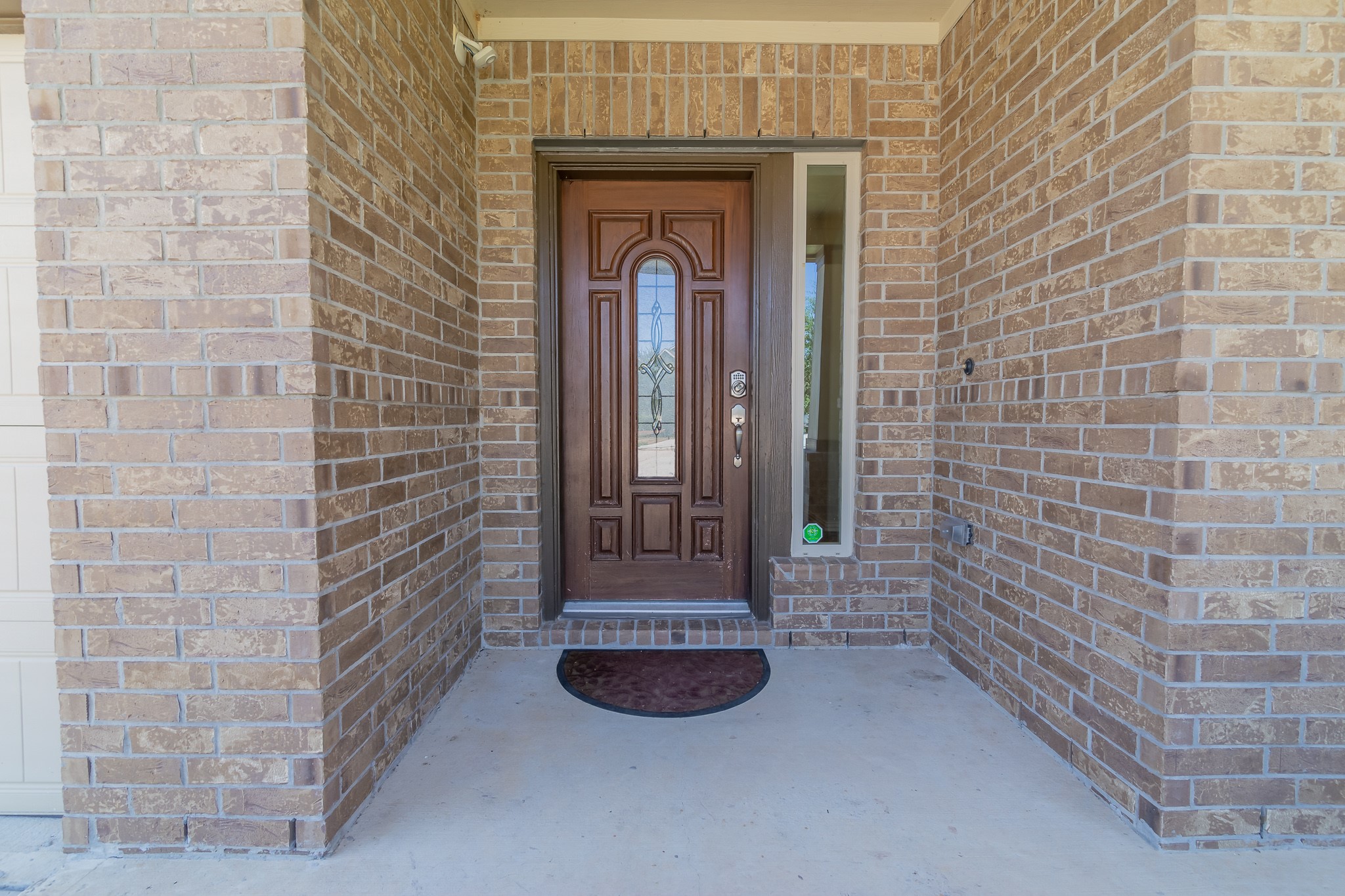 5 Iris Arbor Court Conroe, TX 77301 - Photo 7 of 35 a view of a hallway with brick wall