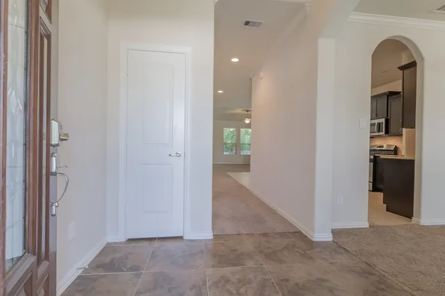 a view of livingroom with hallway