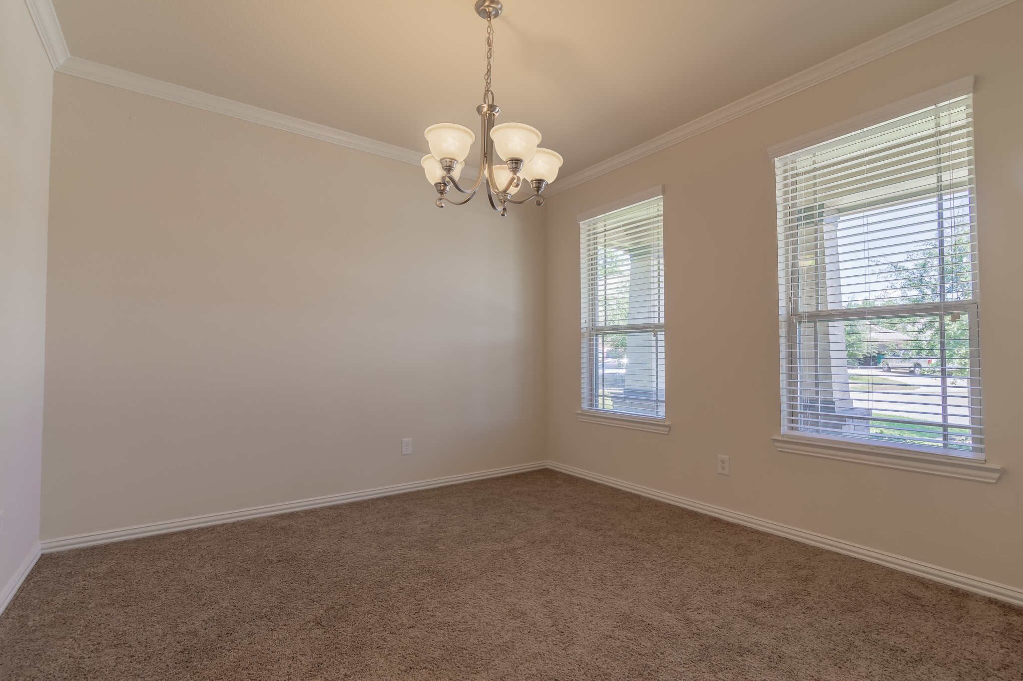 5 Iris Arbor Court Conroe, TX 77301 - Photo 10 of 35 a view of an empty room with a window