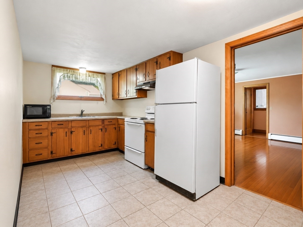15 Main Street Hatfield, MA 01038 - Photo 20 of 42 a kitchen with white cabinets