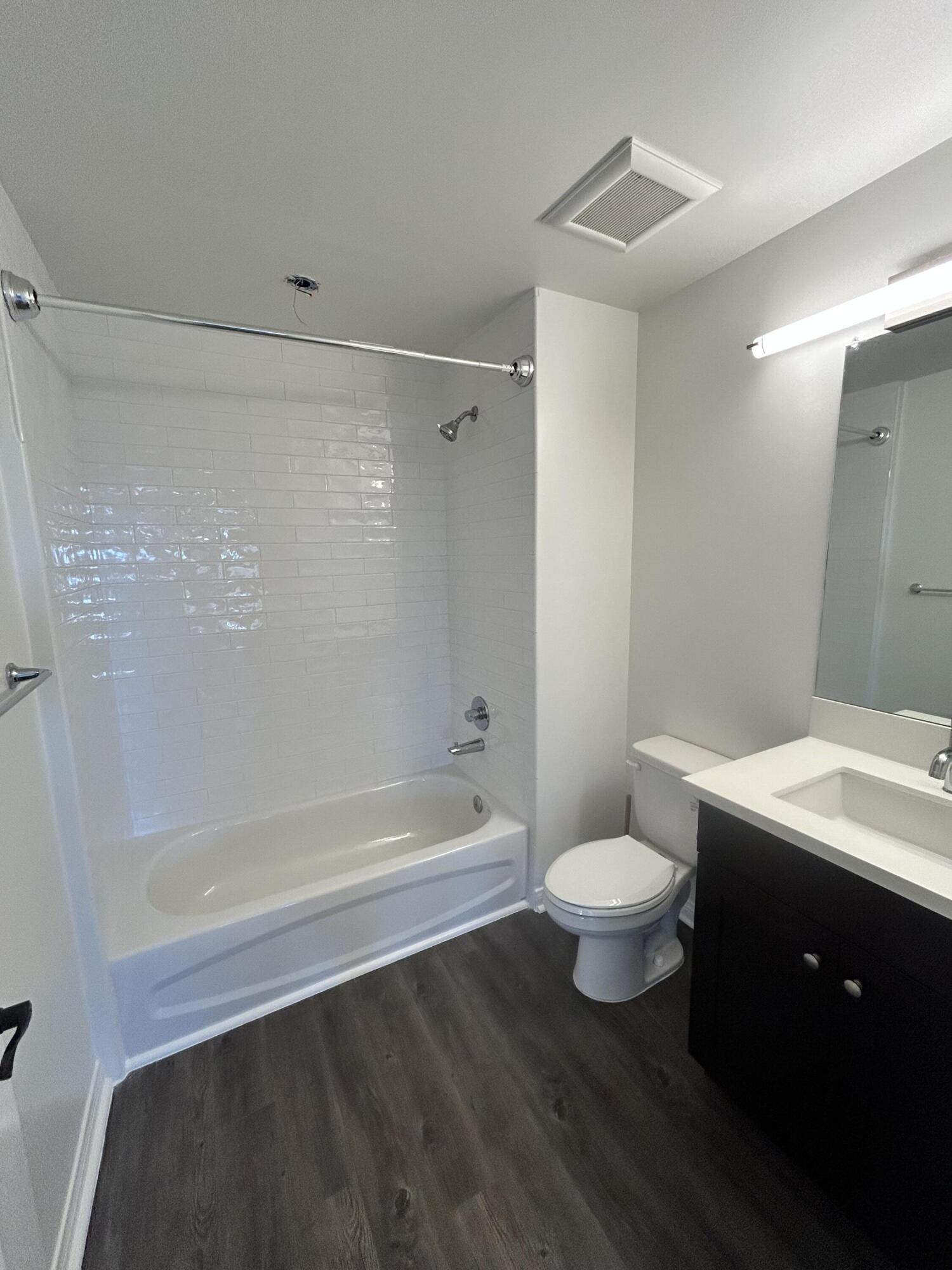 920 Lowena Drive, Unit 9 Santa Barbara, CA 93103 - Photo 4 of 10 a bathroom with a bathtub shower sink vanity and toilet