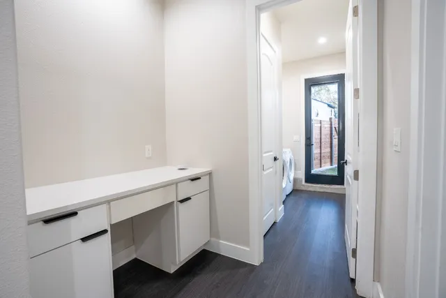 a bathroom with a glass shower door