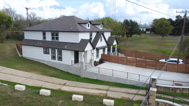 a front view of a house with garage